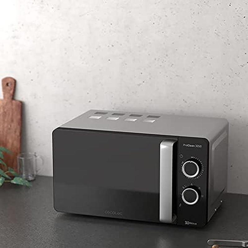 Micro-Ondes Proclean 3050. Capacité De 20 L, Revêtement Ready2Clean, 700 W De Puissance, 6 Niveaux De Fonctionnement, Minuterie 30 Minutes, Mode Décongeler, Finition Noir Et Argenté.