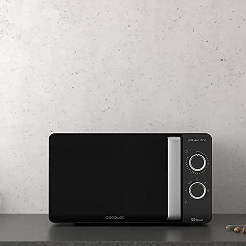 Micro-Ondes Proclean 3050. Capacité De 20 L, Revêtement Ready2Clean, 700 W De Puissance, 6 Niveaux De Fonctionnement, Minuterie 30 Minutes, Mode Décongeler, Finition Noir Et Argenté.