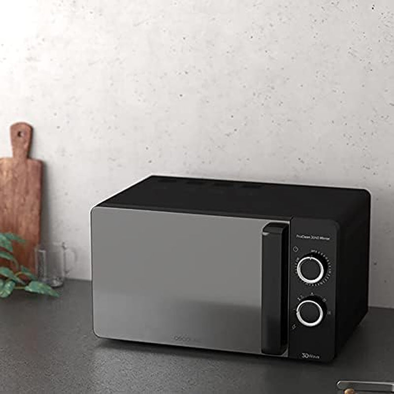 Micro-Ondes Proclean 3040. Capacité De 20 L, Revêtement Ready2Clean, 700 W De Puissance, 6 Niveaux De Fonctionnement, Minuterie 30 Minutes, Mode Décongeler, Finition Noir.